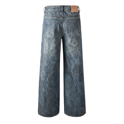 Jean bleu coupe ample style streetwear pour homme, avec délavage unique à motif léopard et feuilles pour un style urbain rétro 100 
