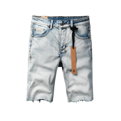 Pantalones cortos vaqueros de estilo urbano para hombre, lavados en azul claro con dobladillo sin rematar y parche gráfico en el bolsillo trasero, 2001 
