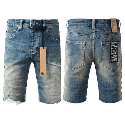 Pantalones cortos vaqueros de estilo urbano para hombre, lavados en azul con detalle roto, dobladillo sin rematar y parche gráfico (2002) 