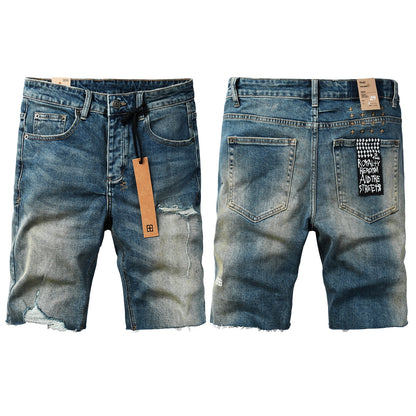 Pantalones cortos vaqueros de estilo urbano para hombre, lavados en azul con detalle roto, dobladillo sin rematar y parche gráfico (2002) 