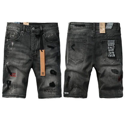 Shorts vaqueros desgastados negros lavados para hombre con parches de grafiti y detalles de estilo urbano (2009) 