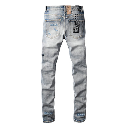 Vaqueros desgastados de corte ajustado azul claro para hombre con costuras decorativas, patchwork gráfico y estilo urbano 3047 