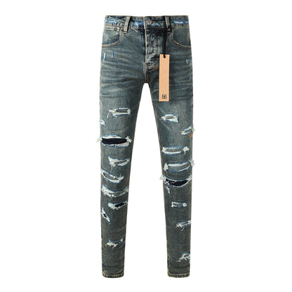 Jean skinny bleu foncé pour homme, très déchiré, avec effet usé et patch graphique au dos, pour un style urbain 3049 