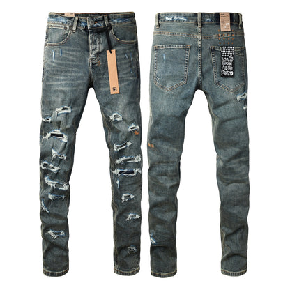 Jean skinny bleu foncé pour homme, très déchiré, avec effet usé et patch graphique au dos, pour un style urbain 3049 