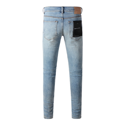Jean bleu déchiré à la mode 9075 avec un design vieilli 