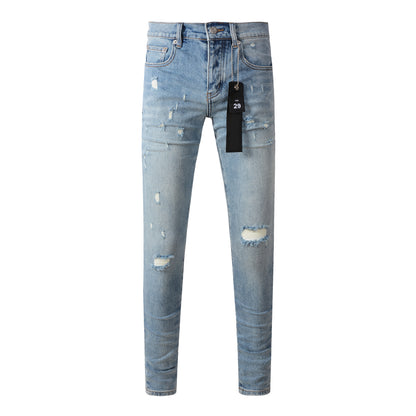 Jean bleu déchiré à la mode 9075 avec un design vieilli 