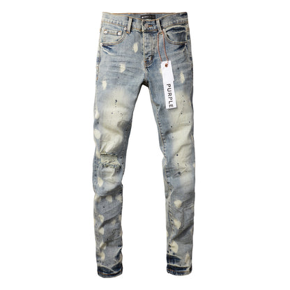 Vaqueros desgastados de hombre con diseño de lunares azul claro y rotos, ajustados 9092 