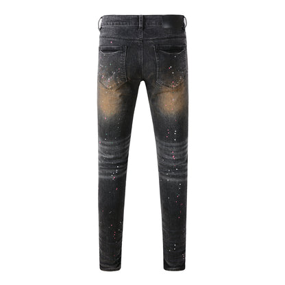 Vaqueros ajustados negros para hombre con lavado en tonos óxido y salpicaduras de pintura multicolor, estilo urbano artístico desgastado 9109 