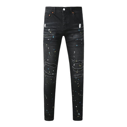 Jean slim déchiré noir pour homme, style streetwear, effet éclaboussures de peinture multicolores et détails déchirés 9121 